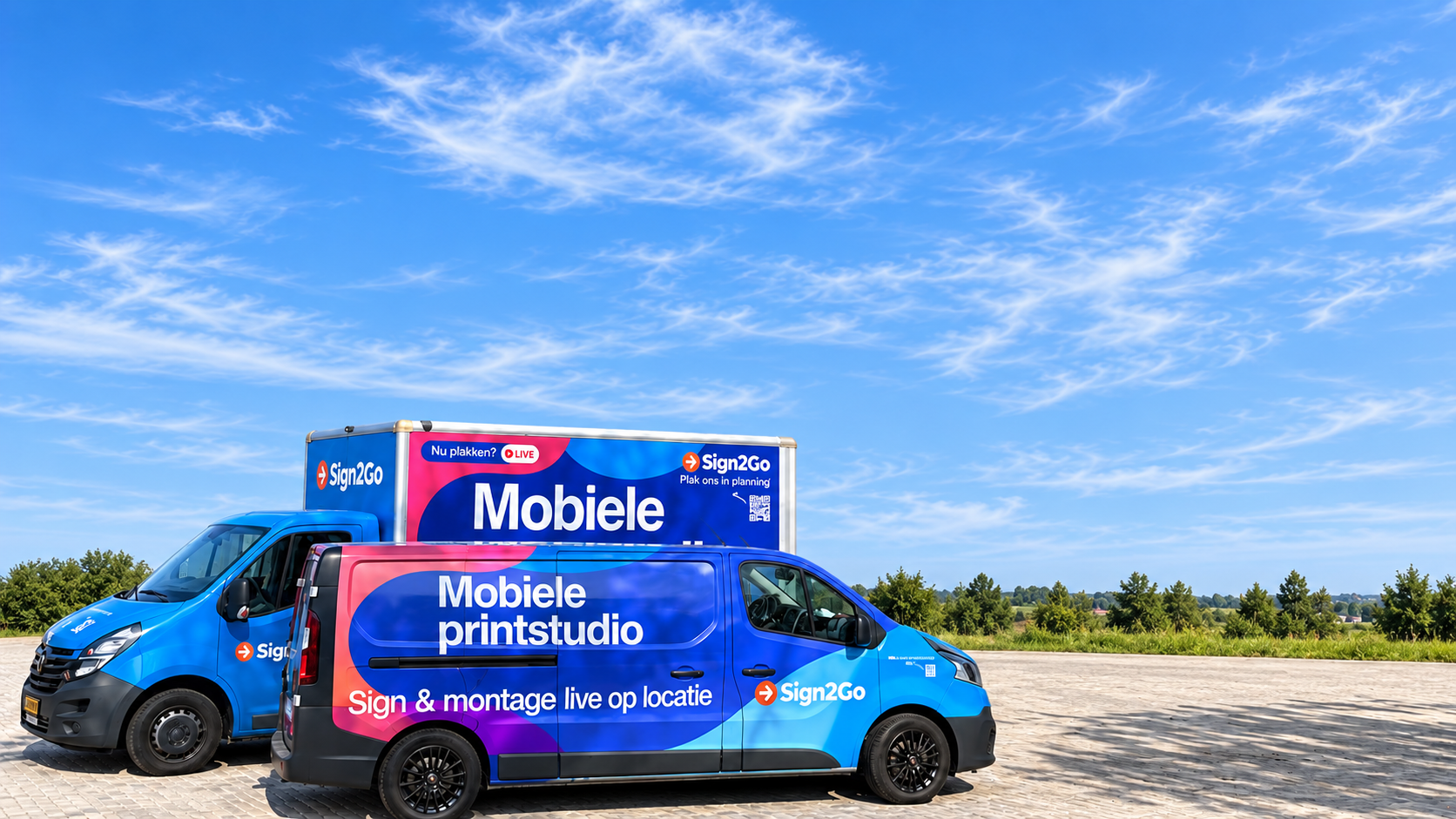 De twee mobiele printbussen van Mobiele Print Studio